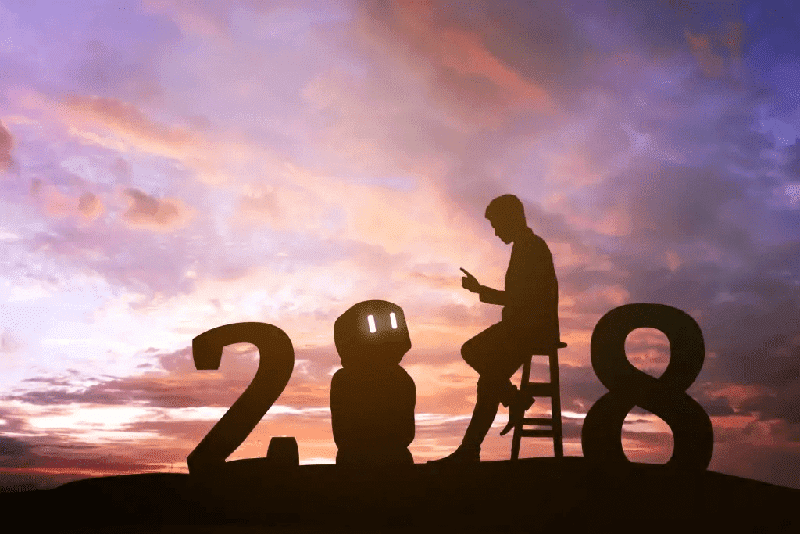 A young man's silhouette lined up with numbers and a friendly robot against a sunset sky